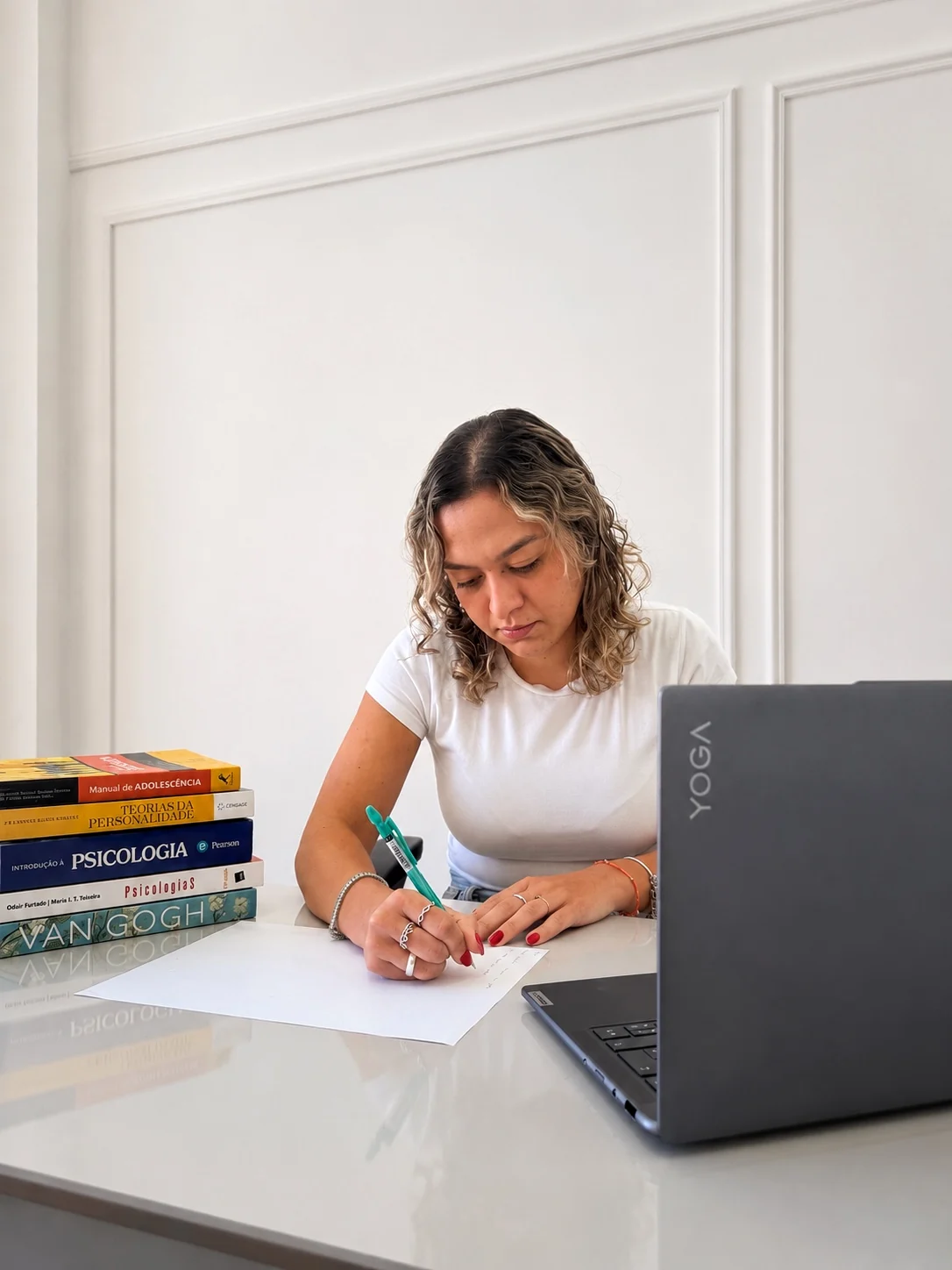 Larissa Benites working at her desk
